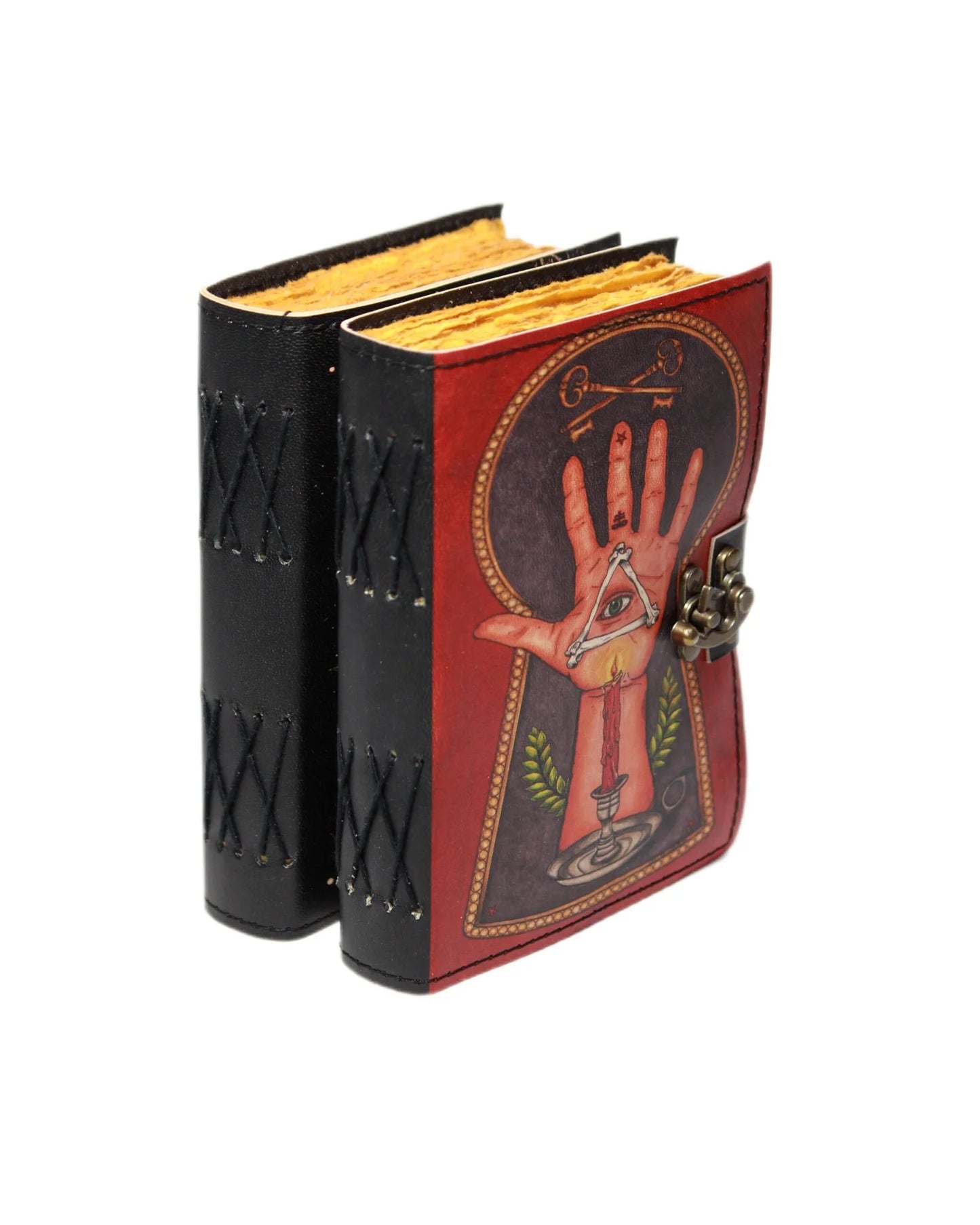 Decorative book with a hand and pyramid design on a white background